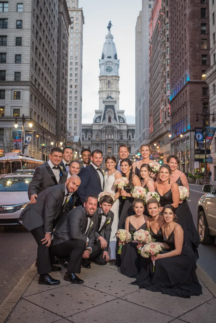 Alan Rhode with lifelong friends on Broad Street in Philadelphia, City Hall behind them
